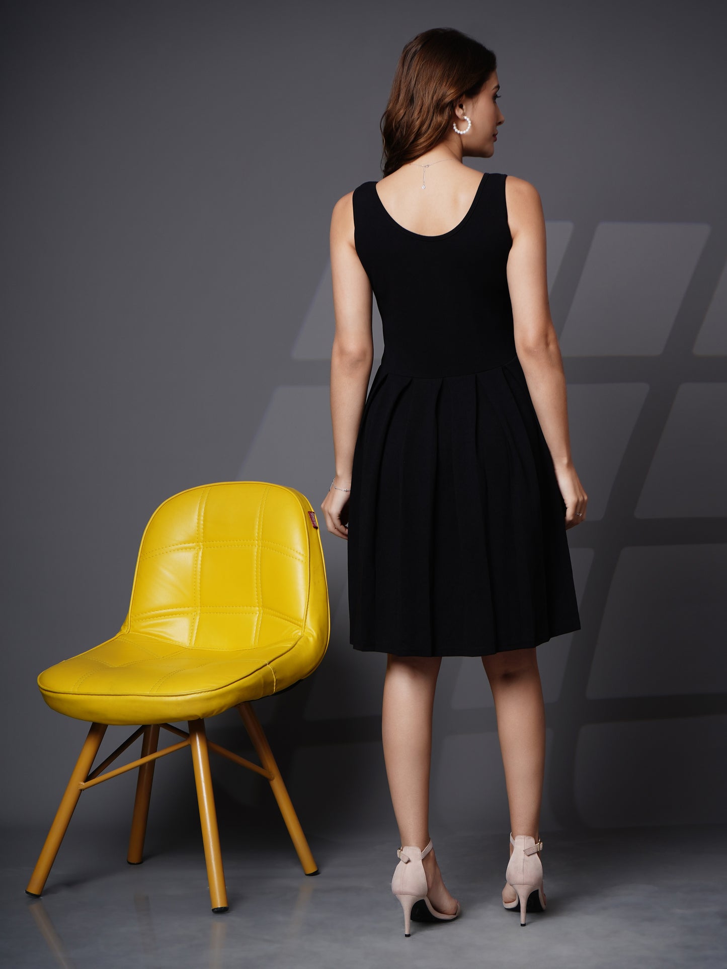 Pleated short sleeve less dress