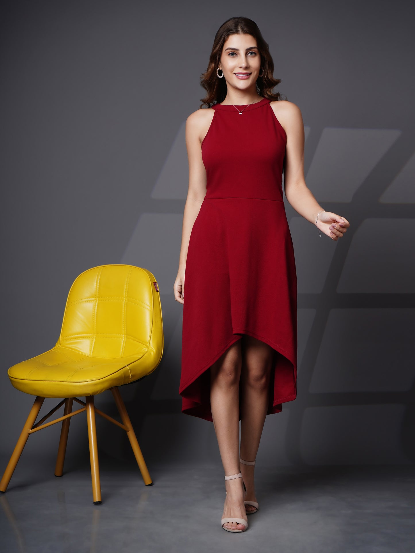 Asymmetric halter neck fit and flare dress Maroon